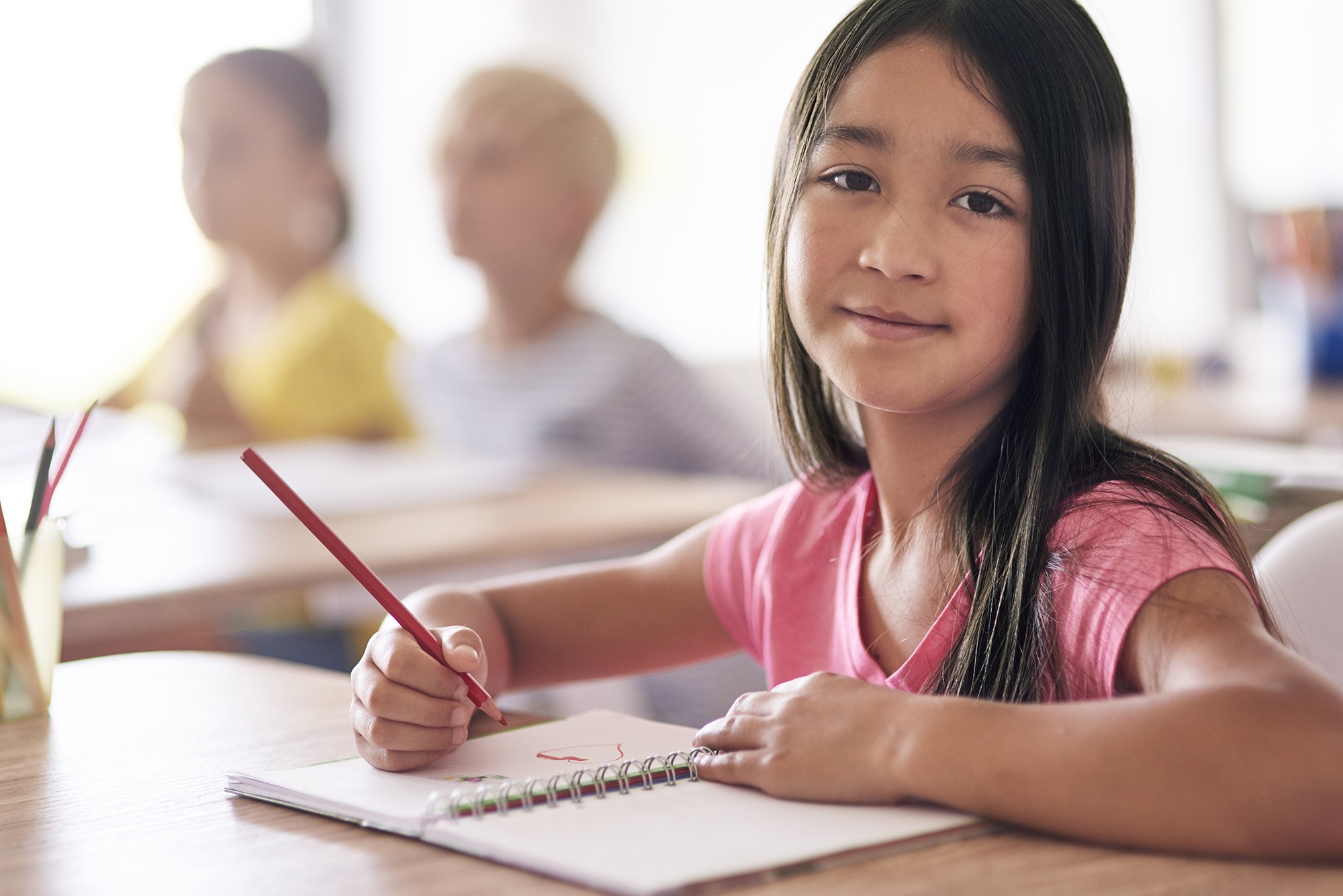 Portrait of a girl doing a lesson