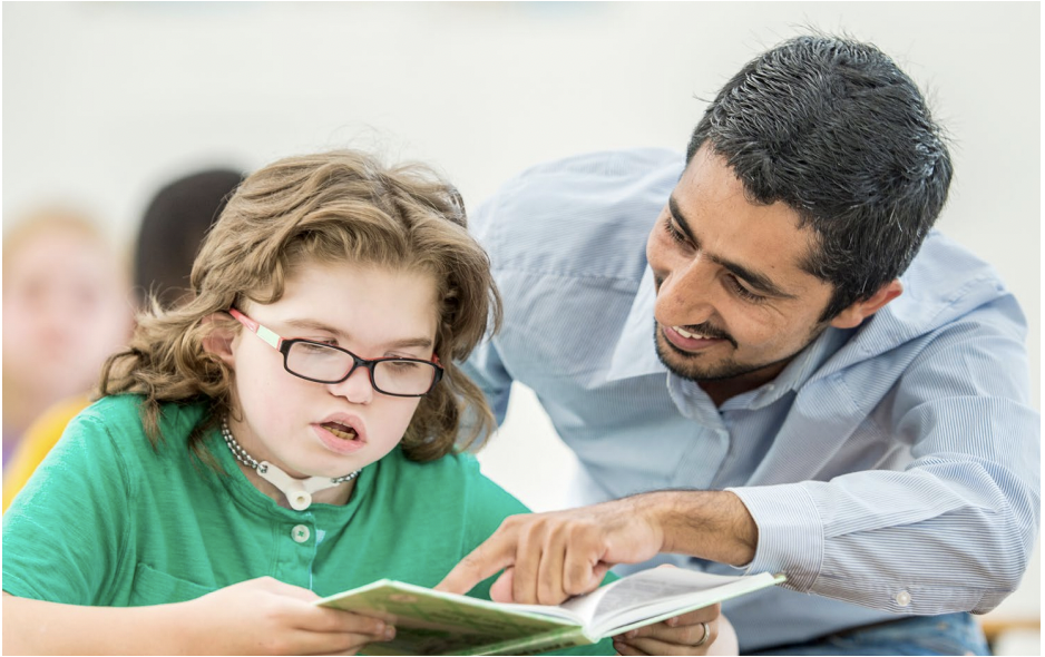 image of a special education teacher with a student