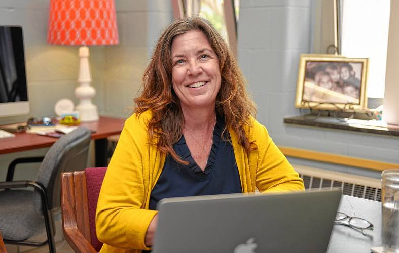 Superintendent Sheryl Stanton, at her desk